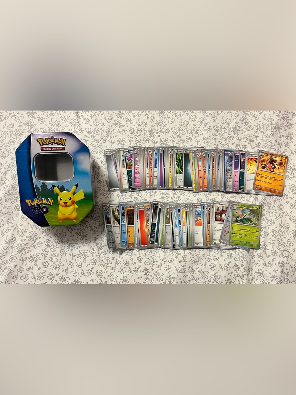 Pokémon Tin with Assorted Cards